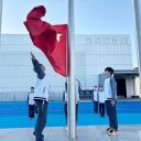 青島為明學校中小學部舉行“重陽敬老”主題升旗儀式